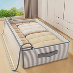 Sac de rangement sous lit pour linge de lit posé sur un lit