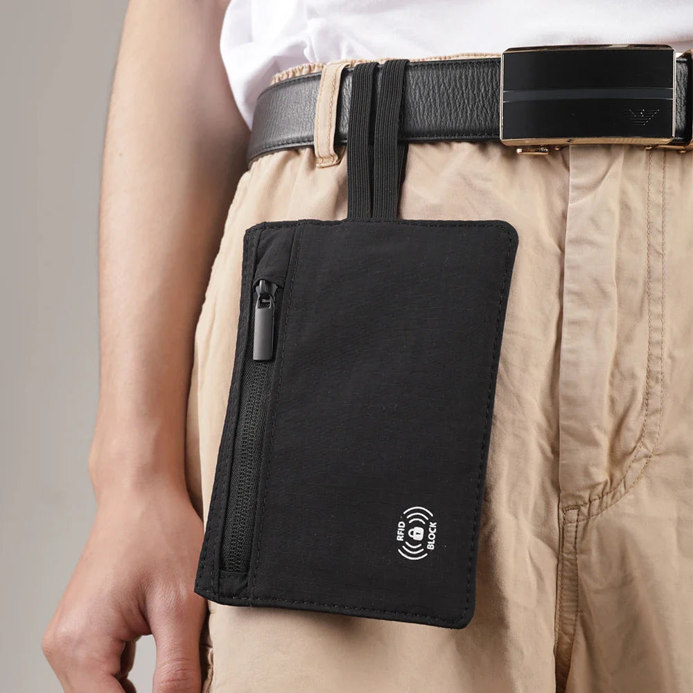 Ceinture de voyage fine portée à la taille pour ranger billets et cartes en sécurité