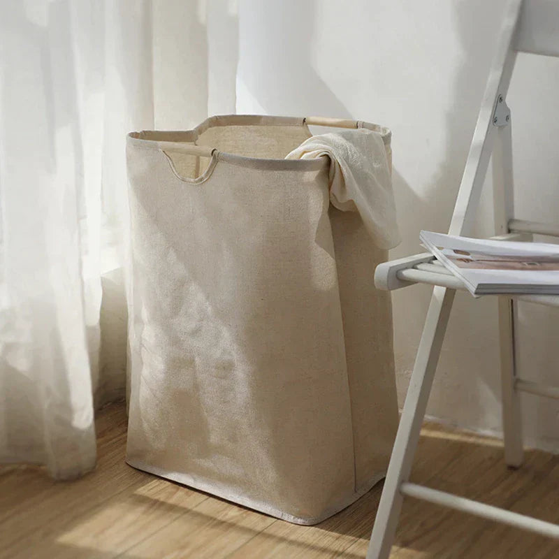 Grand panier à linge avec poignées latérales pour un transport facile