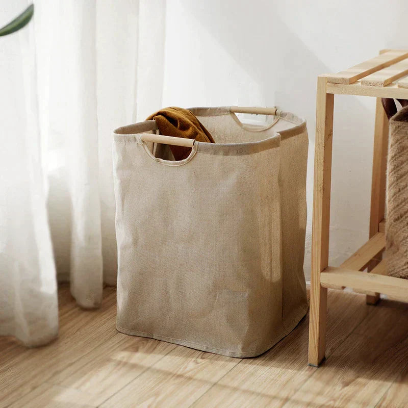 Panier à linge tressé grande capacité avec poignées dans un intérieur moderne