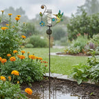 Ornement de jardin en forme de colibri avec pluviomètre sur tige à planter