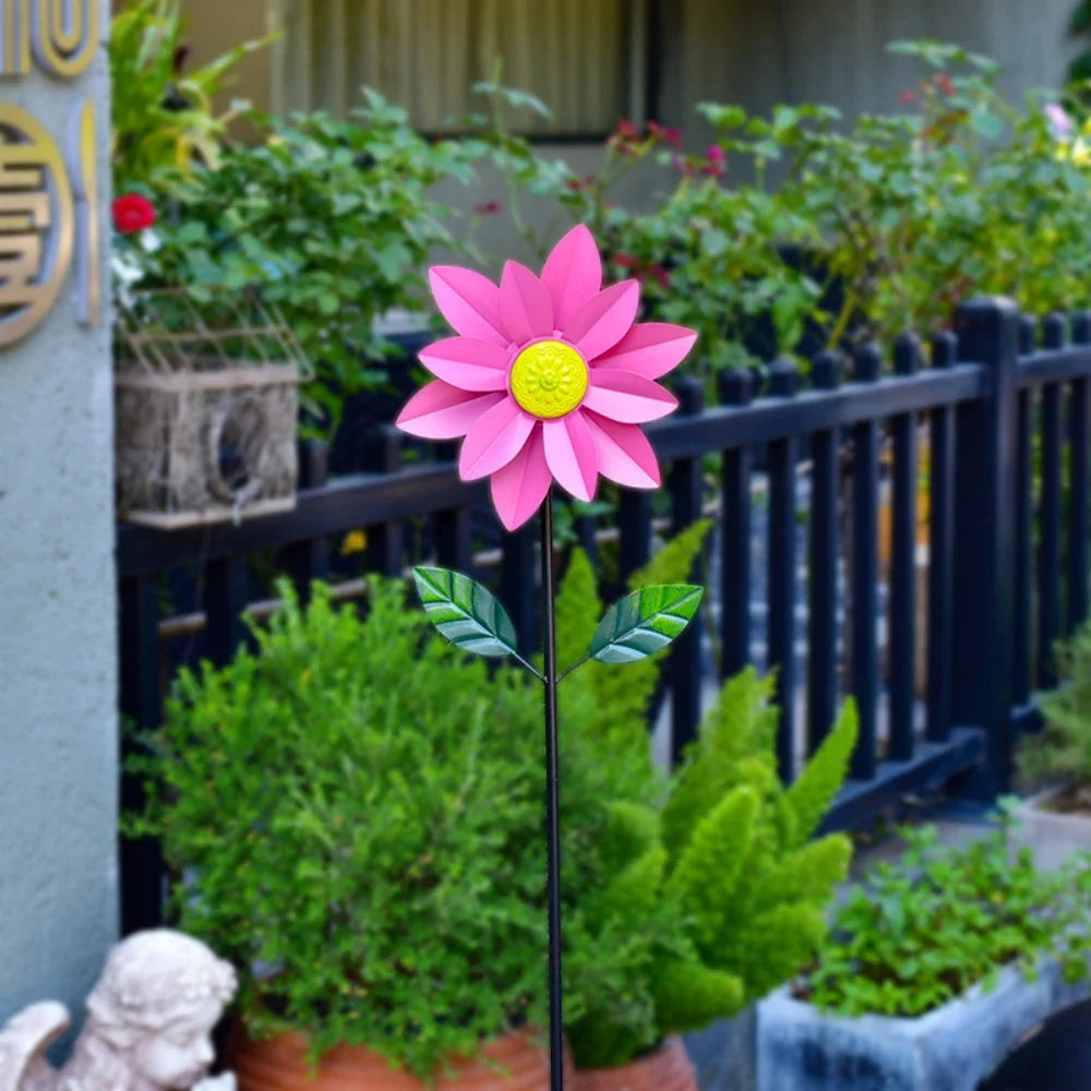 Moulin à vent décoratif pour jardin avec structure en fer et design floral