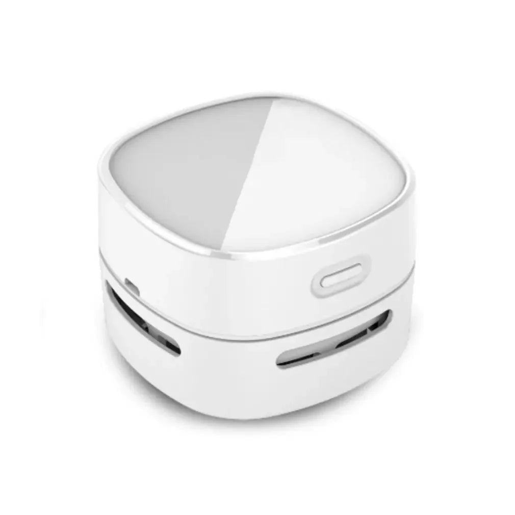 Aspirateur Clariqo nettoyant un clavier d’ordinateur