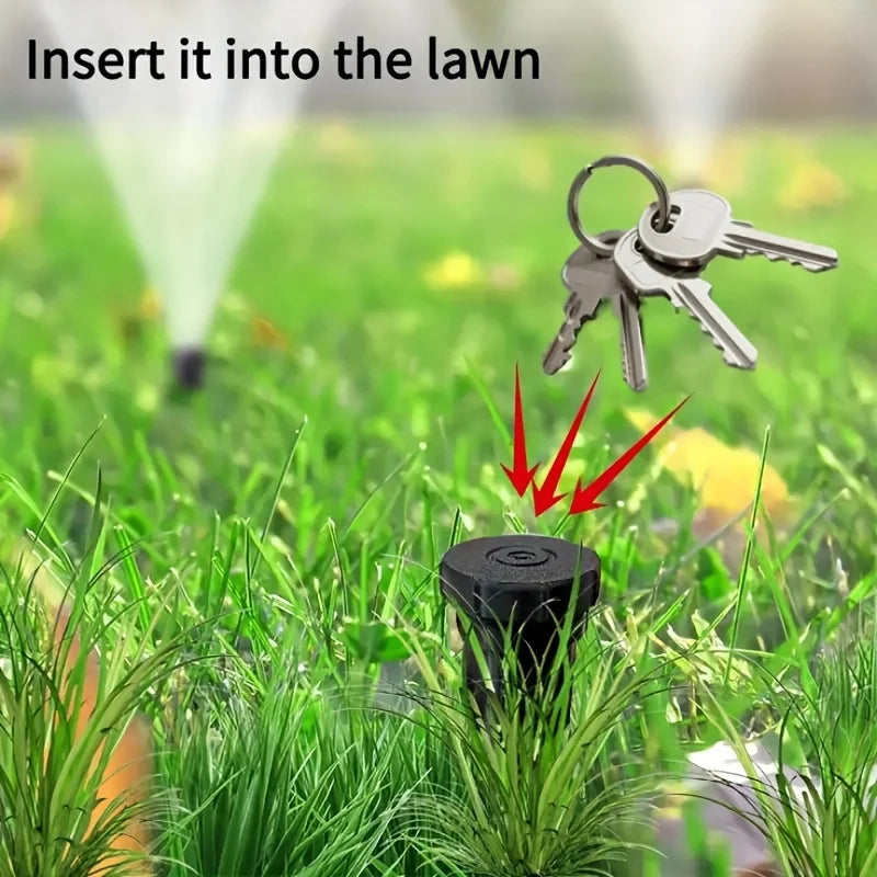 Cache-clés camouflage extérieur installé près d'une allée de jardin