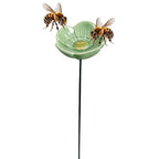 Abreuvoir à insectes Floréa en forme de fleur en céramique dans le jardin